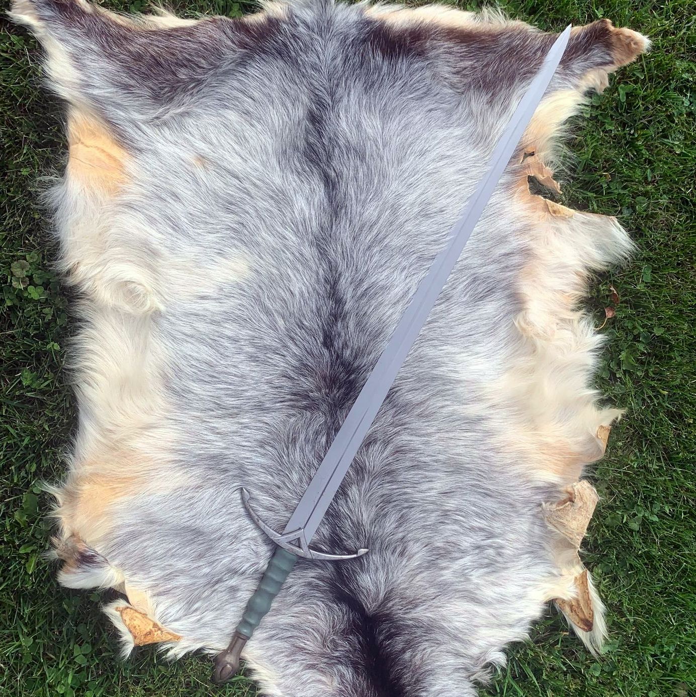 The sword of the forest, displayed on a fur hide